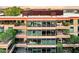 Modern multi-story building with multiple balconies and city views at 7137 E Rancho Vista Dr # 7008, Scottsdale, AZ 85251