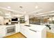 Modern kitchen with white cabinets and a large island at 7137 E Rancho Vista Dr # 7008, Scottsdale, AZ 85251