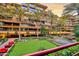 Community putting green and water feature in a lush courtyard at 7137 E Rancho Vista Dr # 7008, Scottsdale, AZ 85251