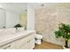 Modern bathroom with a quartz vanity and tile shower at 7137 E Rancho Vista Dr # 7008, Scottsdale, AZ 85251