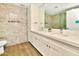Bathroom with double vanity and marble tile at 7137 E Rancho Vista Dr # 7008, Scottsdale, AZ 85251