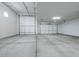 Spacious two-car garage with light-colored flooring at 10010 S 37Th Ave, Laveen, AZ 85339