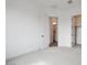 Bright bedroom with plush carpeting and access to a private bathroom and closet at 10010 S 37Th Ave, Laveen, AZ 85339