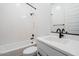 Modern bathroom with white vanity, black fixtures, and a bathtub at 10010 S 37Th Ave, Laveen, AZ 85339
