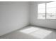 Spacious bedroom with large window and neutral wall colors at 10010 S 37Th Ave, Laveen, AZ 85339