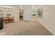 Carpeted dining area with a table and chairs near the kitchen at 8125 E Billings St, Mesa, AZ 85207