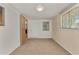 Multi-purpose room with an exterior door and window at 8125 E Billings St, Mesa, AZ 85207