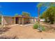 Backyard with shed, covered patio, and ample space at 8125 E Billings St, Mesa, AZ 85207