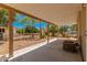 Back patio with covered area and AC unit at 8125 E Billings St, Mesa, AZ 85207