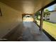 Covered carport with space for two cars and extra storage at 7501 N 59Th Dr, Glendale, AZ 85301