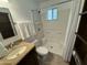 Clean bathroom with a shower/tub combo and granite vanity at 7501 N 59Th Dr, Glendale, AZ 85301