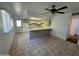 Kitchen with breakfast bar and tiled floor at 7501 N 59Th Dr, Glendale, AZ 85301