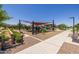 Community playground with shaded play structures at 20955 E Mayberry Rd, Queen Creek, AZ 85142