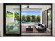 Covered patio with seating area, fire pit, and view of the pool at 4007 E Montecito Ave, Phoenix, AZ 85018