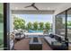 Relaxing backyard oasis with pool, patio furniture, and fire pit at 4007 E Montecito Ave, Phoenix, AZ 85018