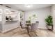Open dining area with table and kitchen access at 4525 N 66Th St # 70, Scottsdale, AZ 85251