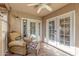 Relaxing patio with comfortable wicker chair and ottoman at 4525 N 66Th St # 70, Scottsdale, AZ 85251