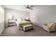 Cozy bedroom with full bed and comfortable armchair at 4525 N 66Th St # 70, Scottsdale, AZ 85251