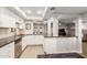 Modern kitchen with white cabinets, stainless steel appliances and dark countertops at 4525 N 66Th St # 70, Scottsdale, AZ 85251