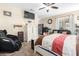 Spacious bedroom with king-size bed, massage chair, and ample closet space at 20051 N Herbert Ave, Maricopa, AZ 85138
