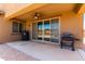 Covered patio with built-in grill and ceiling fan at 20051 N Herbert Ave, Maricopa, AZ 85138