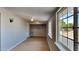 Bright laundry room with ample storage and window at 5480 E Boston St, Mesa, AZ 85205