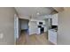 Modern kitchen with white cabinets, quartz countertops and stainless steel appliances at 5480 E Boston St, Mesa, AZ 85205