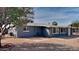Ranch style home with a large backyard and mature trees at 5480 E Boston St, Mesa, AZ 85205