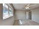 Bright bedroom with carpet and large window at 5480 E Boston St, Mesa, AZ 85205