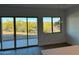 Dining area with sliding glass doors leading to a patio and scenic views at 14036 E Barbie Ln, Scottsdale, AZ 85262