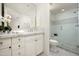 Bathroom with marble countertops and a walk-in shower at 9975 E Broken Spur Dr, Scottsdale, AZ 85262