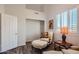 Cozy bedroom with comfortable seating and natural light at 9768 E Balancing Rock Rd, Scottsdale, AZ 85262