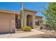 Front entry and walkway with a large saguaro cactus at 9768 E Balancing Rock Rd, Scottsdale, AZ 85262
