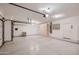 Spacious garage with ample storage and overhead door at 9768 E Balancing Rock Rd, Scottsdale, AZ 85262