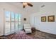 Serene bedroom with sliding doors and a comfy armchair at 9768 E Balancing Rock Rd, Scottsdale, AZ 85262