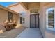 Ornate front door and decorative wall art at 9768 E Balancing Rock Rd, Scottsdale, AZ 85262
