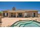 Back of house with covered patio and pool at 9768 E Balancing Rock Rd, Scottsdale, AZ 85262
