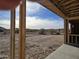 Under-construction covered patio offering a view of the desert landscape at 1973 W Brooke Ln, Queen Creek, AZ 85144