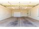 Spacious garage with built-in storage cabinets and access to home at 2550 S Ellsworth Rd # 366, Mesa, AZ 85209