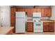 Well-equipped kitchen offers modern appliances and substantial wood cabinetry at 2550 S Ellsworth Rd # 366, Mesa, AZ 85209