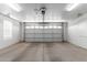 Attached garage with an automatic door and extra storage at 2550 S Ellsworth Rd # 366, Mesa, AZ 85209