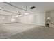 Clean and spacious garage with overhead storage at 1973 W Brooke Ln, Queen Creek, AZ 85144
