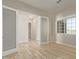 Spacious office with wood-look tile floors and large window at 1973 W Brooke Ln, Queen Creek, AZ 85144