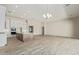 Modern kitchen with a large island and stainless steel appliances at 1973 W Brooke Ln, Queen Creek, AZ 85144