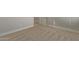 Bright bedroom with neutral colored carpet at 1973 W Brooke Ln, Queen Creek, AZ 85144