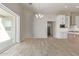 Open dining area with wood-look floors and access to the patio at 1973 W Brooke Ln, Queen Creek, AZ 85144