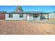 Updated single story home with covered porch and new landscaping at 3832 E Willow Ave, Phoenix, AZ 85032