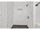Modern bathroom with marble-tiled shower and hexagon floor at 1873 E Ellis Dr, Tempe, AZ 85282