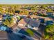 Aerial view of a single story home with a green lawn at 1873 E Ellis Dr, Tempe, AZ 85282