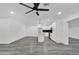 Modern kitchen with white cabinets, quartz countertops, and stainless steel appliances at 1873 E Ellis Dr, Tempe, AZ 85282